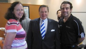 John J. Rendemonti, attorney at law, and his wife Joyce talk with Gaglioti at the opening. 