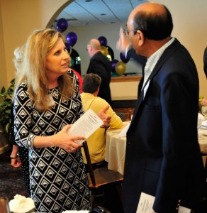 Carolyn Daniels, running for school board from Region C, talks with Jay Patel at the GOP lunch.