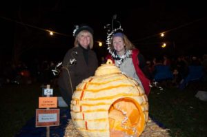 April Margera, left, and her friend Donna Wetterlund with their beehive. They made the bees from pumpkin seeds.