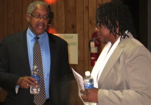 Kennett Square Borough Council President Leon Spencer chats with Cheryl Miles, chair of Chester County's Hunger and Homelessness Awareness Week Committee.