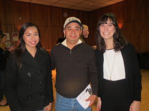 Jaime Alvarez (center), who spoke eloquently about giving back to the community, is joined by his 14-year-old daughter Natalia and Kate Uhler, a 2014 Community Champion Award recipient who served as his translator. 