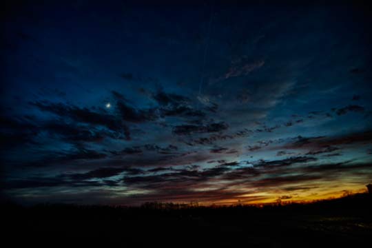 Read more about the article Photo of the Week: Moon Over Sunset