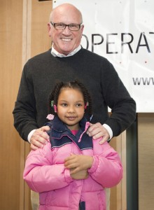 Dick Sanford says the smiles on children's face repeatedly make the work at Operation Warm gratifying.