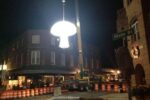 The giant fungus will drop from a crane into the middle of the intersection of Union and State Streets.