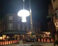 The giant fungus will drop from a crane into the middle of the intersection of Union and State Streets.