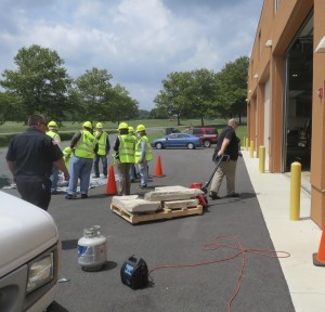 Members of a CERT training session participate in a simulated rescue exercise.