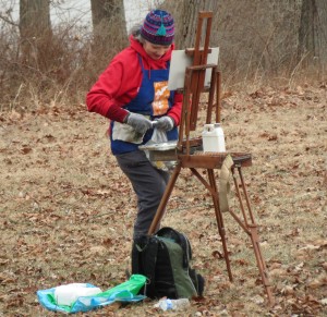 Ellen Gavin, a New Jersey artist, finds that opening a tube of paint is more challenging in the cold. She set up her easel in front of N.C. Wyeth's former studio.  
