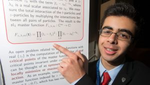 Shashwat Kishore explains his project at the