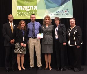 Flanked by Magna Award officials, school board member Carolyn Daniels (second from left), Patton Principal Tim Hoffman, Patton Project Gardens co-creator Betsy Ballard, and school board member Kathy Do are shown at the Best Practices for School Leaders Luncheon.