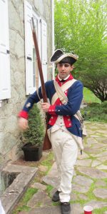 Brian Wolf, a re-enactor connected to the Brandywine Battlefield and the 2nd Pennsylvania Regiment, adds a touch of authenticity to the fundraiser.