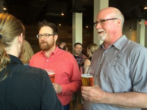 Co-founders of Victory Brewing Company, Bill Covaleski (left) and Ron Barchet , listen to feedback on their new Kennett Square brewpub.