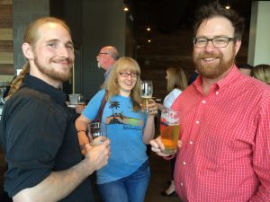 Alex Waegel (from left) and Cassie Hepler, publisher of ExplorePhilly.com, enjoy a beer with Bill Covaleski.