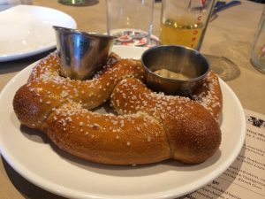 Although the Kennett Square menu features new offerings, some of the bar fare, such as a hand-tossed pretzel with Dusseldorf mustard and HopDevil cheese, originated at the company's first location in Downingtown.