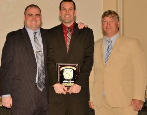 Longwood Fire Chief A. J. McCarthy (from left) Mike Syska, and President Brad Bowman are shown at the company's annual banquet.