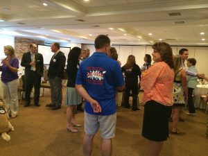 Members of the Southern Chester County Chamber of Commerce mingle during Network at Noon at the Hartefeld National 