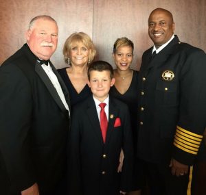 Alex Collins poses with Chester County Deputy Sheriff Harry McKinney (from left), Chester County Sheriff Carolyn 'Bunny' Welsh, Underwood and Chester County, S.C. Sheriff Alex Underwood.