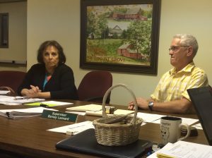 Pocopson Township Supervisors Ricki Stumpo (from left) and Barney Leonard listen to residents' comments during their Aug. 17 meeting.