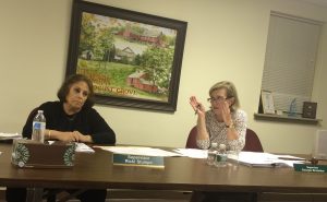 Pocopson Township Supervisor Ricki Stumpo (left) listens and Supervisor Georgia Brutscher makes a point during Monday night's supervisors' meeting.