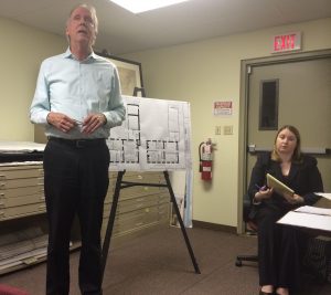 Dennis Melton, architect for the Barnard House project, discusses the revised floor plan as township solicitor Amanda Sundquist listens.