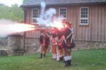 Members of the 1st Delaware Regiment Revolutionary Reenactment display their firepower at Chesterdale Farm in East Bradford Township at a fundraiser for Friends of Strode's Mill.
