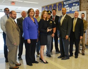 Prem Kumar (from left), project manager for Harris Corporation; Robert Kagel, director of Chester County Department of Emergency Services; Cary Vargo, Upper Uwchlan Township Manager; Commissioner Kathi Cozzone; Kevin Kerr, Upper Uwchlan Township supervisor; Commissioner Michelle Kichline; Upper Uwchlan Township Police Chief John DeMarco; Pickering Valley Elementary School Principal Joe Fernandes; Commissioner Terence Farrell, Downingtown Area School District Superintendent Dr. Lawrence Mussoline; and Downingtown Area School District Chief Security Officer Tim Hubbard attend the radio testing on Wednesday, Sept. 30. 