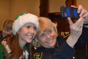 Chester County Sheriff Carolyn 'Bunny' Welsh (right) takes an 'elfie selfie' with Katie Martin, president of the West Chester Rotary.
