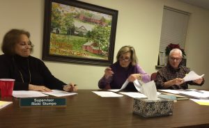 Pocopson Township Supervisors Ricki Stumpo (from left), Georgia Brutscher, and Barney Leonard deal with a full agenda at the last supervisoys' meeting of 2015.