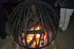 A fire pit in the Hourglass Lake Pavillion warms visitors on Thursday, Friday and Saturday evenings at Longwood Gardens.