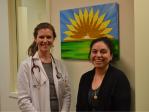 Catherine Elliott (from left), LCH women’s health medical director, is shown with Clara Vasquez, legal advocate for the Domestic Violence Center. Photo courtesy of La Comunidad Hispana