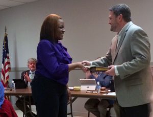 LaToya Myers (left) accepts congratulations from Kennett Square Mayor Matt Fetick after her appointment to Borough Council.