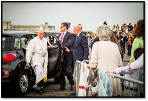 Pope Francis is shown exiting a Fiat, his transportation during his September visit to Philadelphia, that is going up for auction. Photo courtesy of the World Meeting of Families