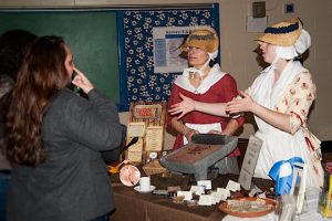 Sandi Johnson, left, and Allison Schell, of the Chadds Ford Historical Society give an informal talk on the history of chocolate making.