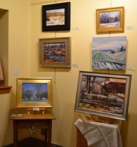 Some of the paintings were displayed on collectibles from Brandywine View Antiques, which were also for sale.