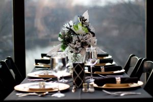Guests will bring elegant table settings and gourmet meals.