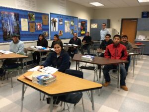 Teacher Matt Di Filippo works with level 1 students at Kennett High School.