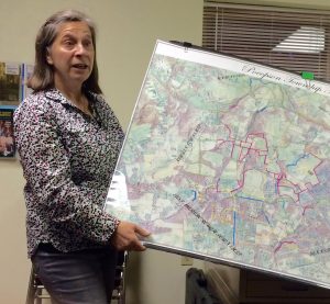 The Brandywine Conservancy's Sheila Fleming uses maps to highlight a presentation on trails in Pocopson Township.