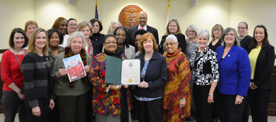 Chester County Commissioners Terence Farrell, Kathi Cozzone and Michelle Kichline with representatives from the “Your Vote is Your Voice! Empowered Women Vote” organization, along with Chester County employees, at the presentation of the Women’s History Month proclamation. 