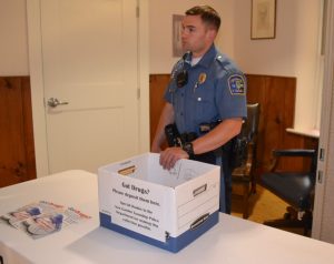 New Garden Township Police Officer Matthew Jones offers a safe way to dispose of unwanted medication.