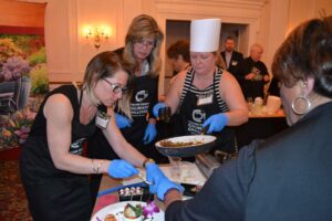 All hands are busy as the clock approaches the deadline for completing the Chester County Culinary Challenge.