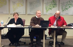 Kennett Township Supervisors Whitney S. Hoffman (from left), Richard L. Leff, and Scudder G. Stevens review materials during their meeting on Wednesday, April 6.