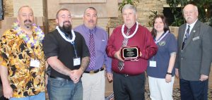  Ron Linville (from left), president of PA APCO, is shown with Chester County Telecommunicator Jon Kromer, Assistant Supervisor Todd Ziegler, Telecommunicator Mark Bynum, Telecommunicator Heather Lindner, and APCO Executive Board Member JJ Mcfarlan.