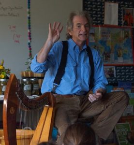 Author and storyteller Robin Moore captivates an audience of fifth-graders at Pocopson Elementary School.