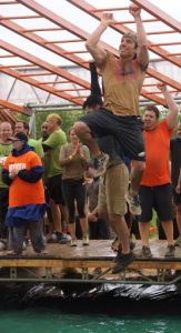 Failure to hang on can result in an unwelcome dunk during Tough Mudder Philly.