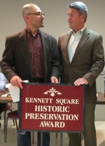 Bob Norris (right) receives congratulations from Borough Council President Danilo Maffei for his historic preservation award.
