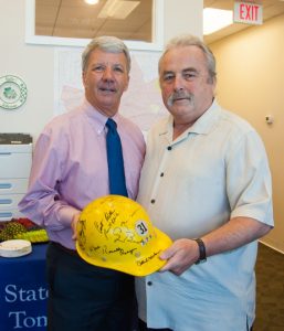 State Sen. Tom Killion, left, with John Vernon of Aston. Vernon was showing the old hard hat he wore while an employee of Sun Ship. The hat bears the autographs of numerous politicians, including those of former Presidents Regan, Bush and Clinton.