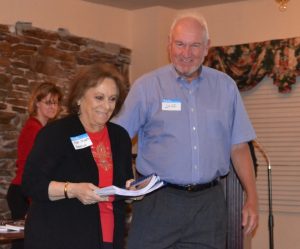 Pocopson Township Supervisors' Chairwoman Ricki Stump (left) and Jeff Taylor, a Pocopson resident, receive copies of the latest publications detailing the Battle of the Brandywine.