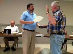 Kennett Square Mayor Matt Fetick performs the swearing-in for Anthony J. DiFazio, who was approved to fill a vacancy on the Civil Service Commission.