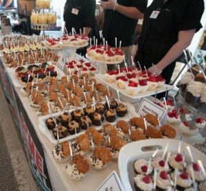 A wide array of desserts tempts the crowd at Twisted Vintner.