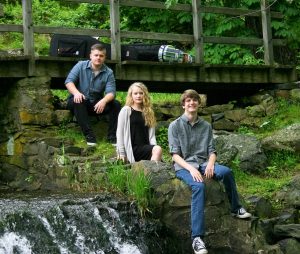 Dylan Richardson (from left), Haley Richardson and Pennsbury Township resident Keegan Losel have won accolades for their Irish music trio.