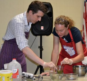 Justin Beatty (left) and Pandora Young demonstrate the spherification process.